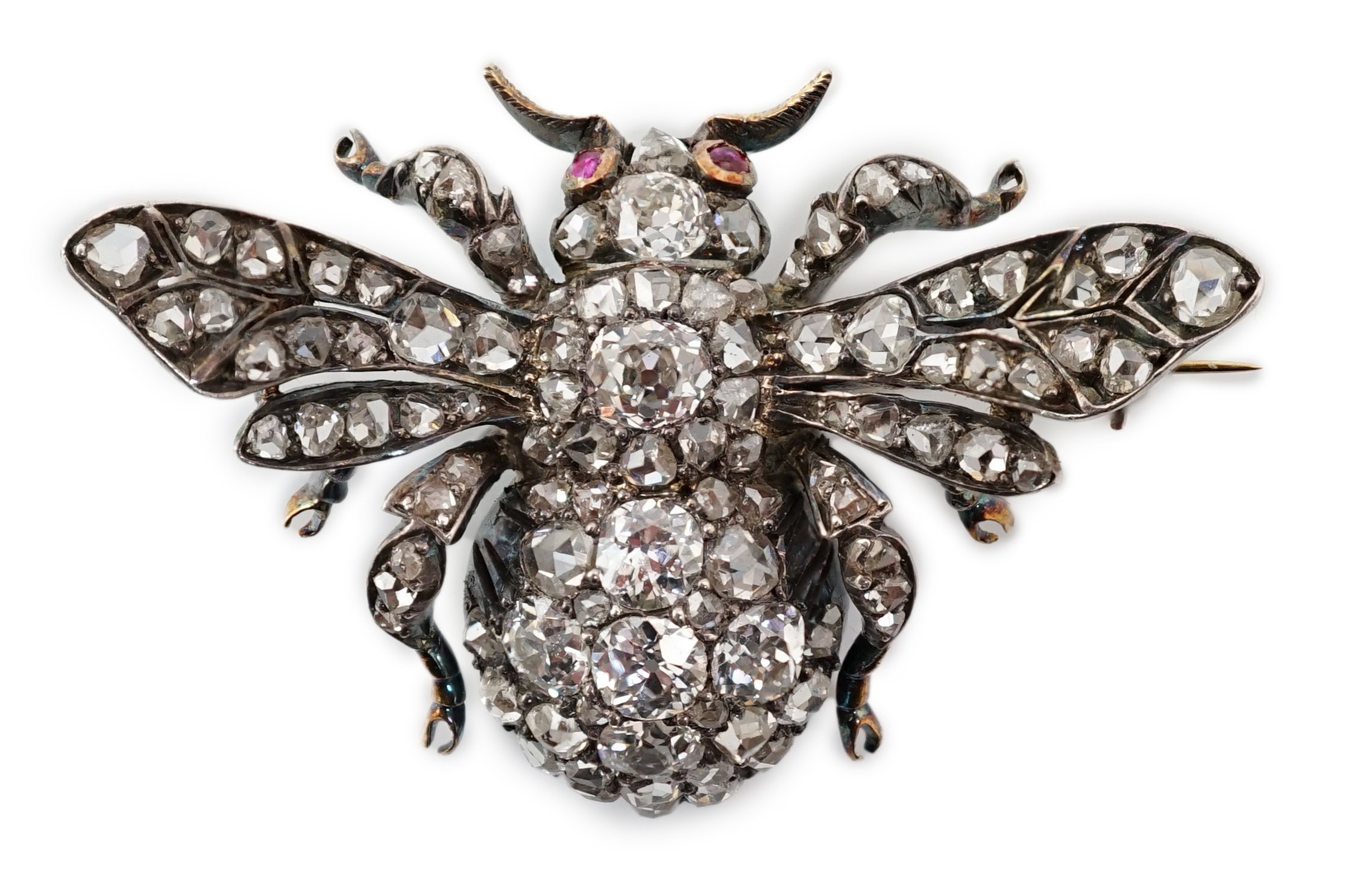 A Victorian gold, silver and diamond encrusted bee brooch